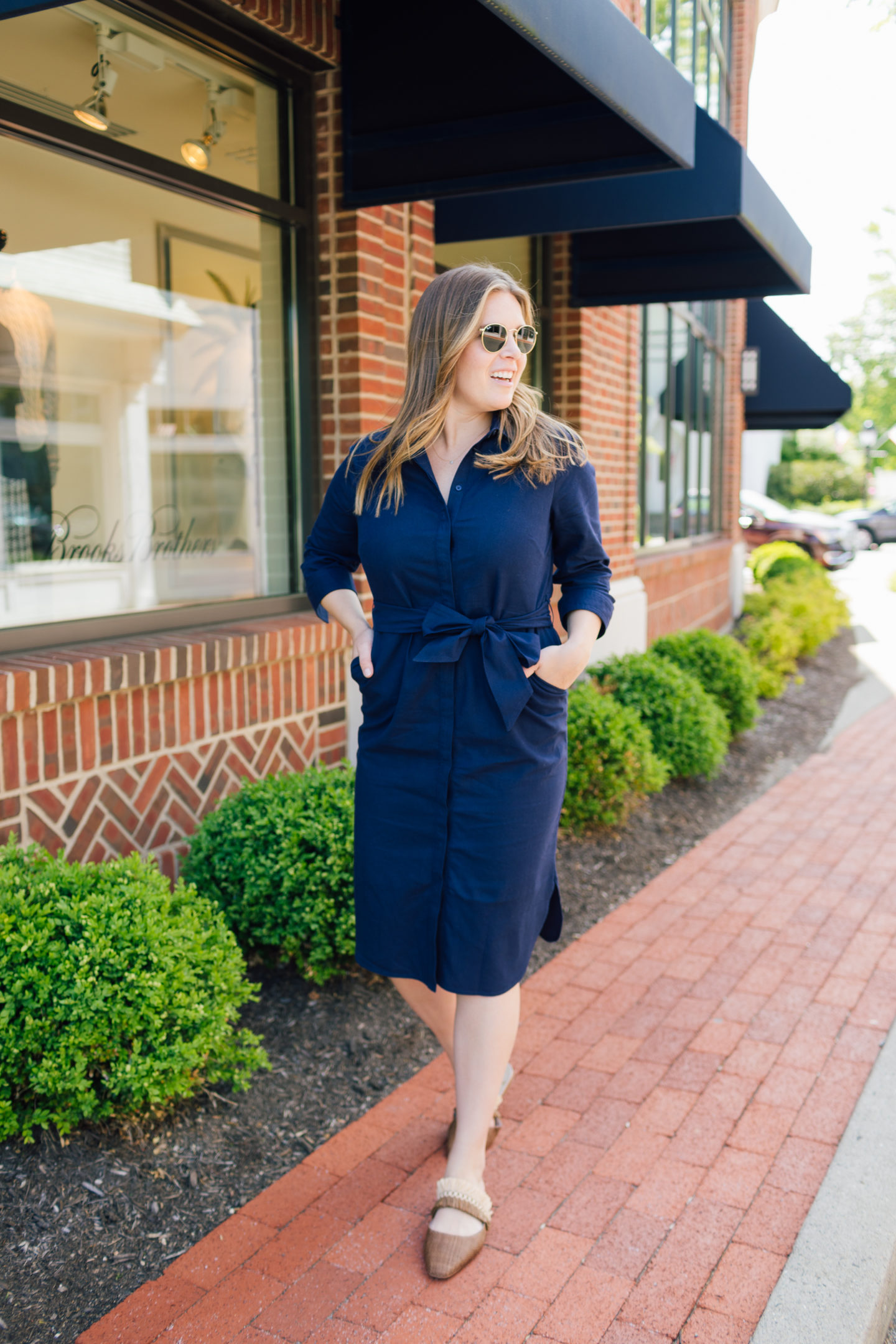 Emily Lucille wearing the Boden Linen Shirt Dress in Navy with Boden Rosa Mules 